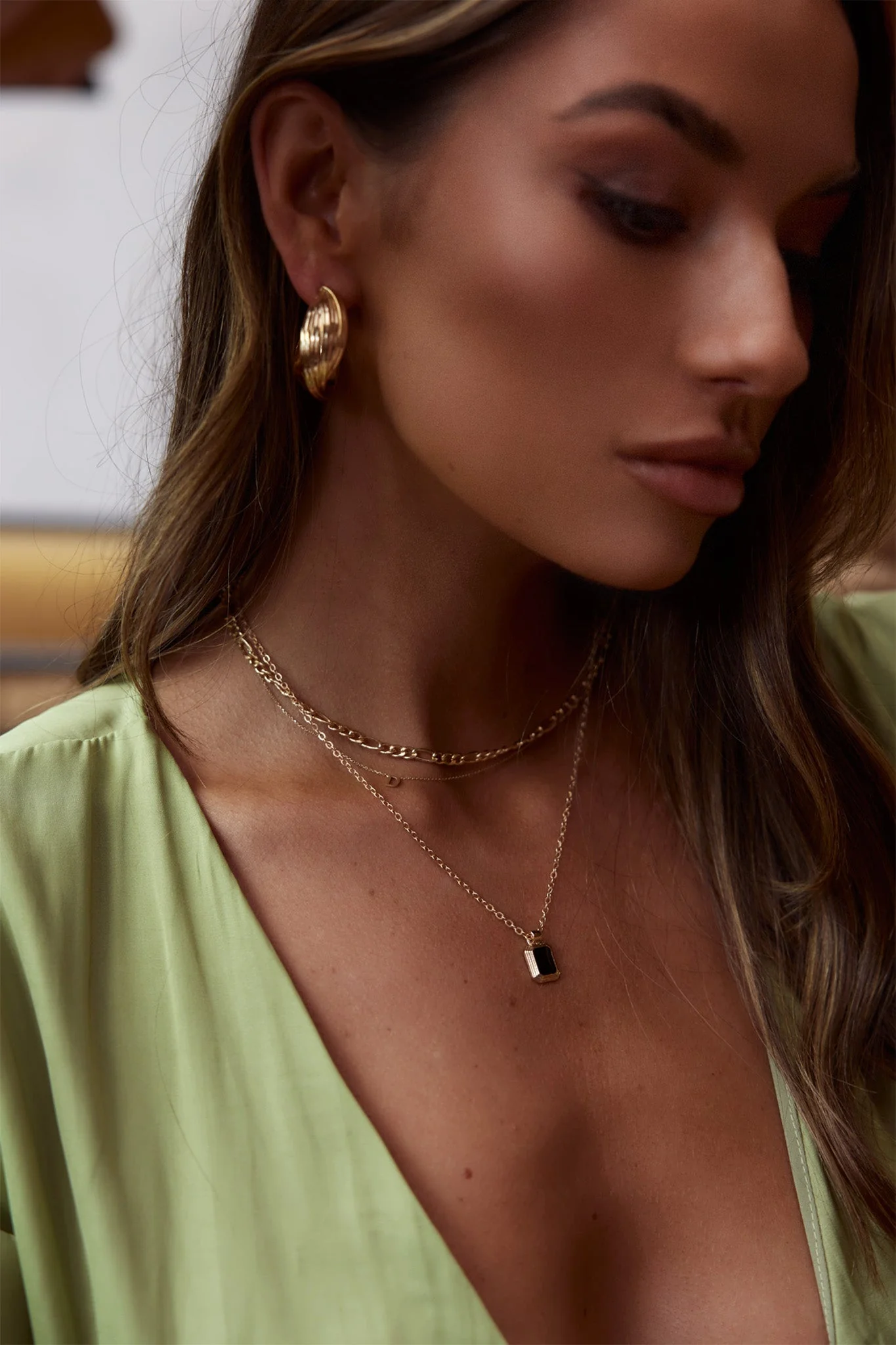 Celia Twist Hoop Earrings Gold - Image 7