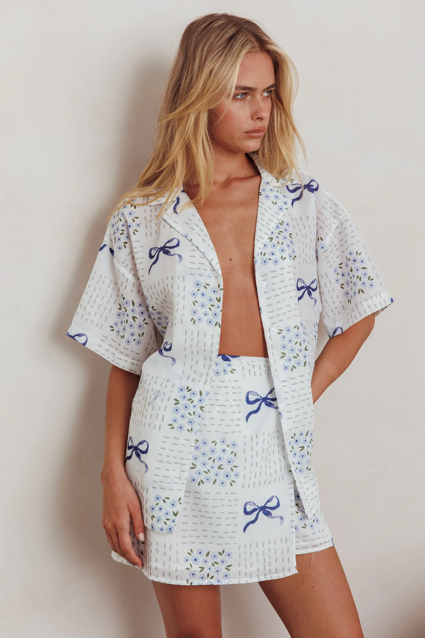 Ithaca Wrap Mini Skirt Bow Print Blue - Image 2