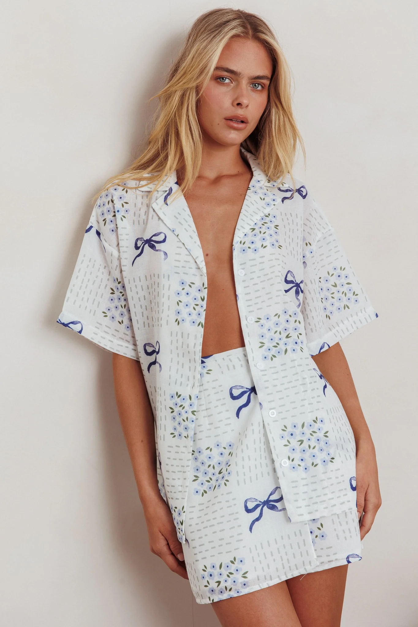 Ithaca Wrap Mini Skirt Bow Print Blue - Image 4